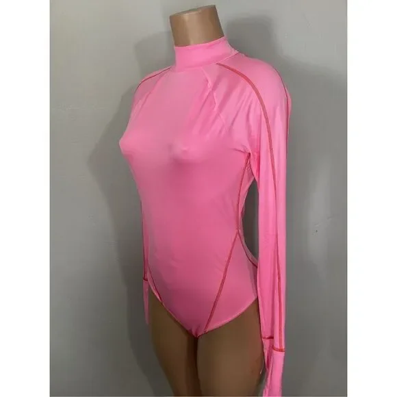 New. Hot as hell for Free People pink rash guard. Large. Retails $240